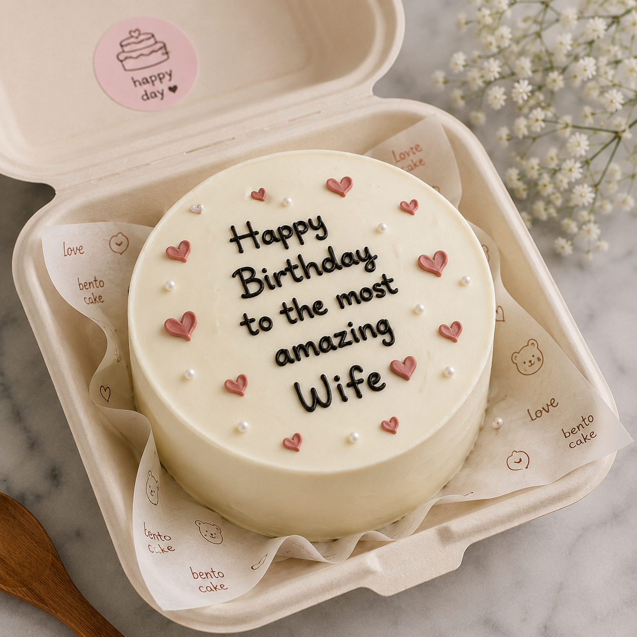Cute mini bento cake with pastel writing